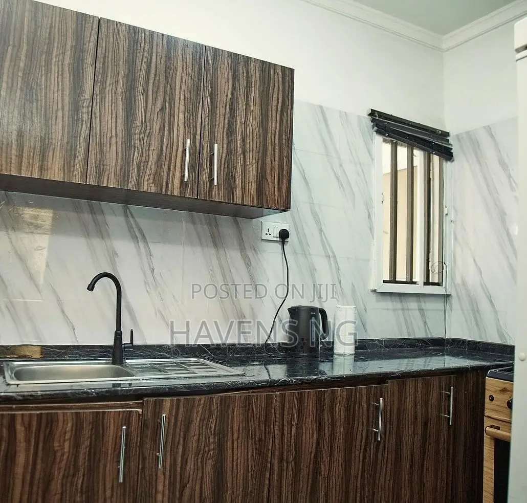 Stylish Brown-Themed 1-Bedroom Apartment for Shortlet in Zone 3 / Wuse