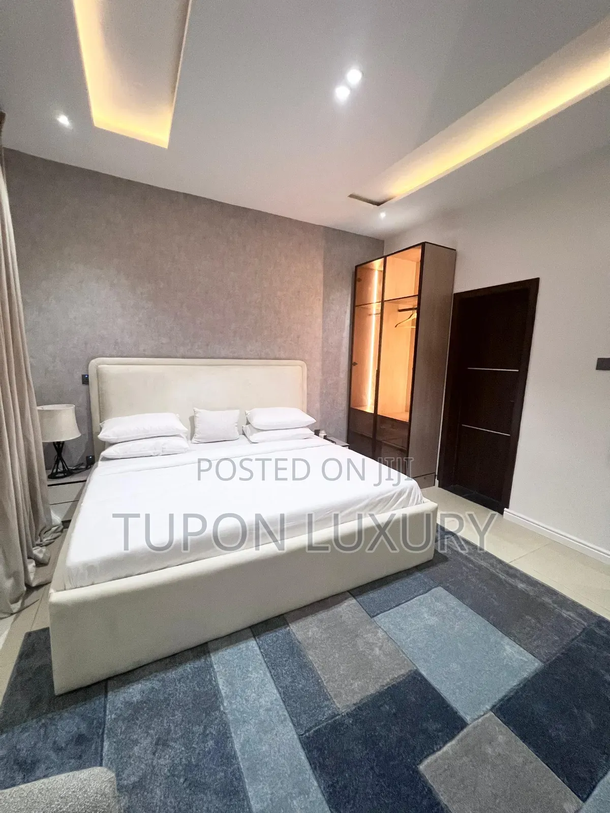Luxury 2 Bedroom Apartment With Ps5 ,Smart Lock and Equipped Kitchen in Ogba GRA