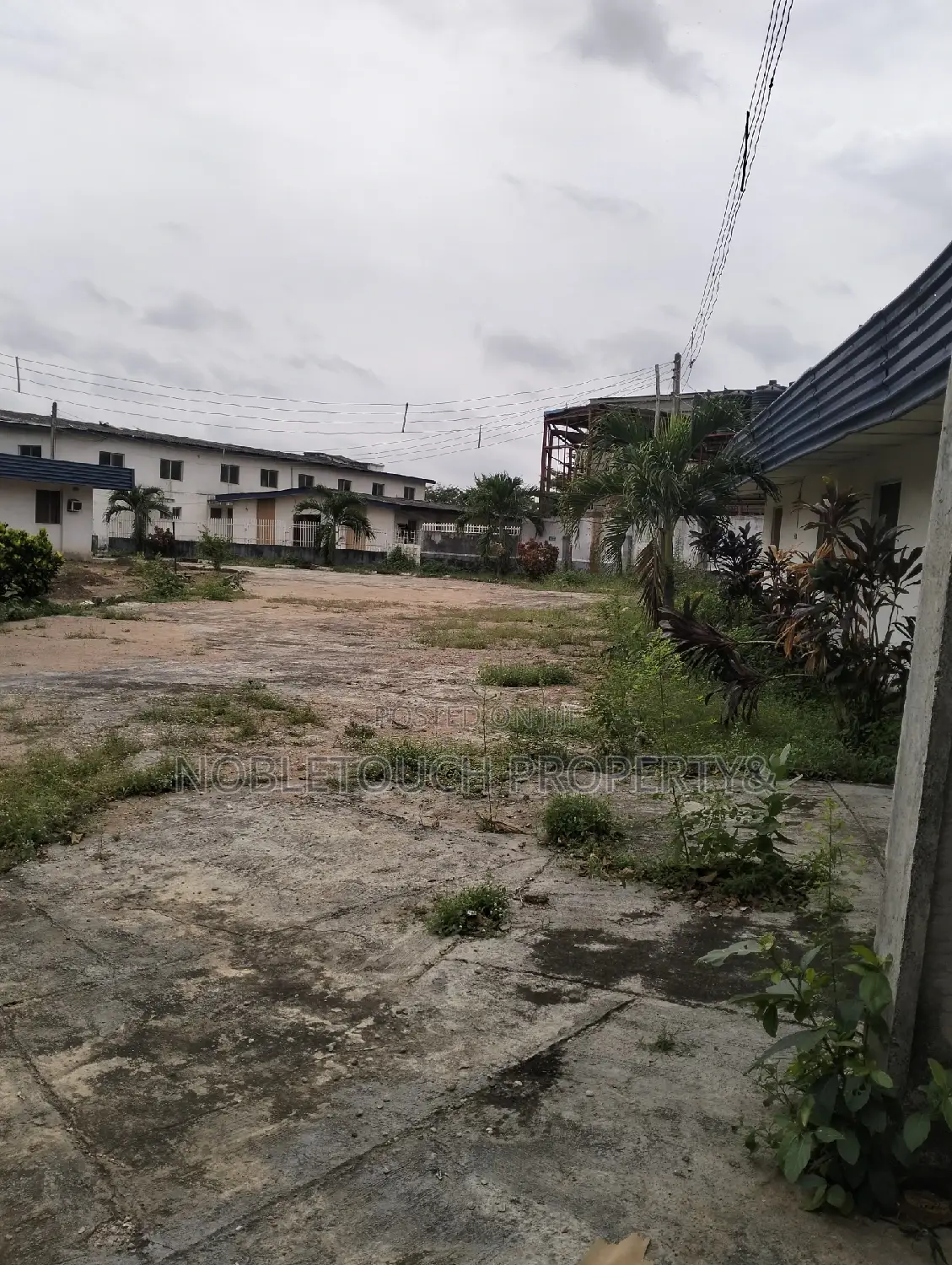 18 Plots Together Along the Major Road in Iseri Olofin