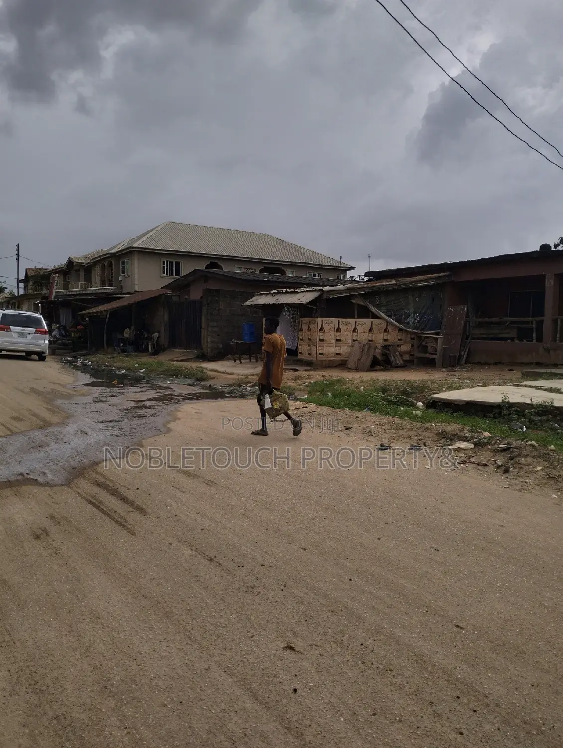 Demolishable Structure on Tarred Street in Iseri Olofin