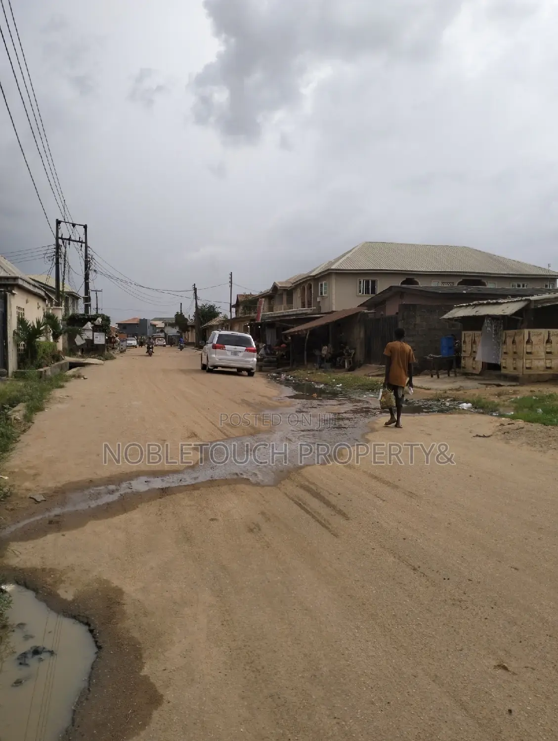 Demolishable Structure on Tarred Street in Iseri Olofin