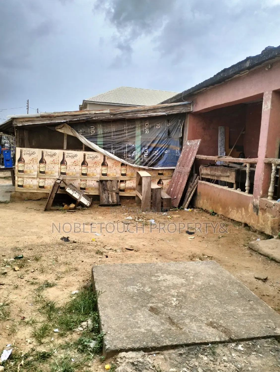 Demolishable Structure on Tarred Street in Iseri Olofin