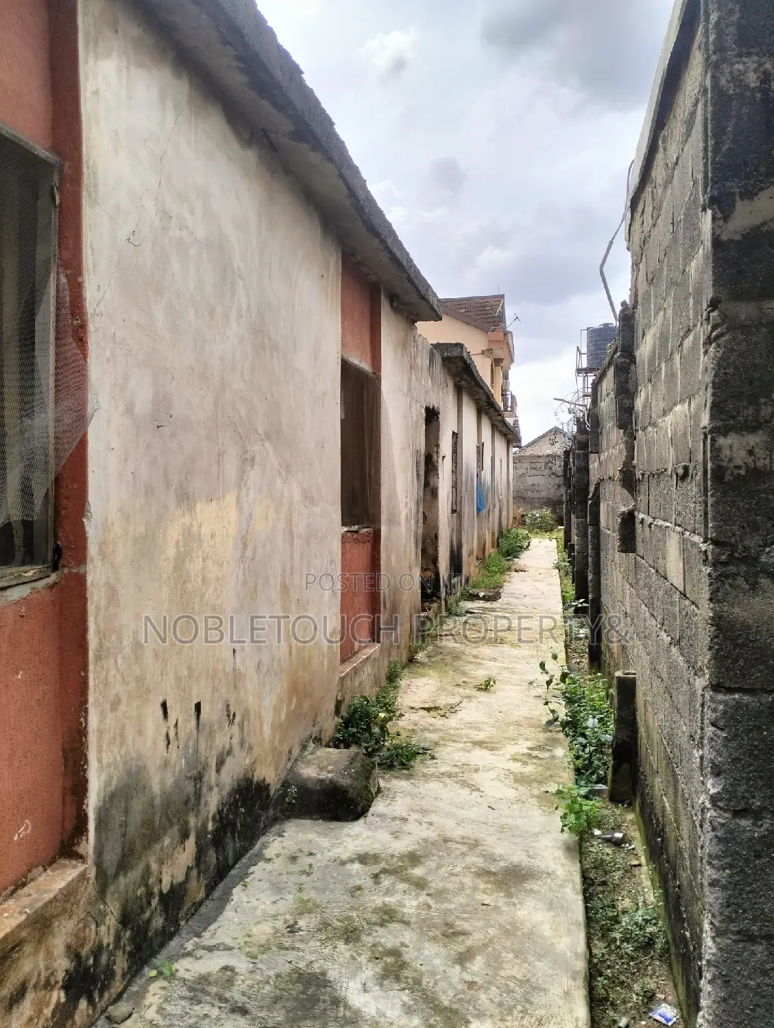 Demolishable Structure on Tarred Street in Iseri Olofin