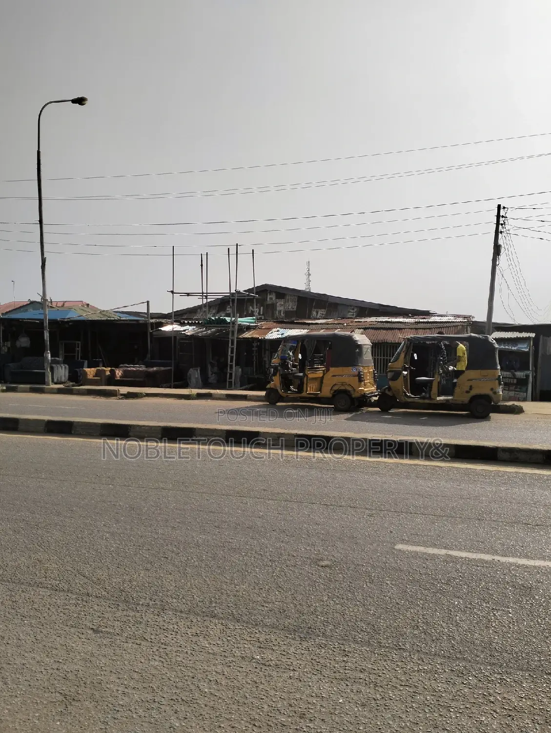 Commercial Building With Enough Shops Along the Major Road in Igando / Ikotun/Igando