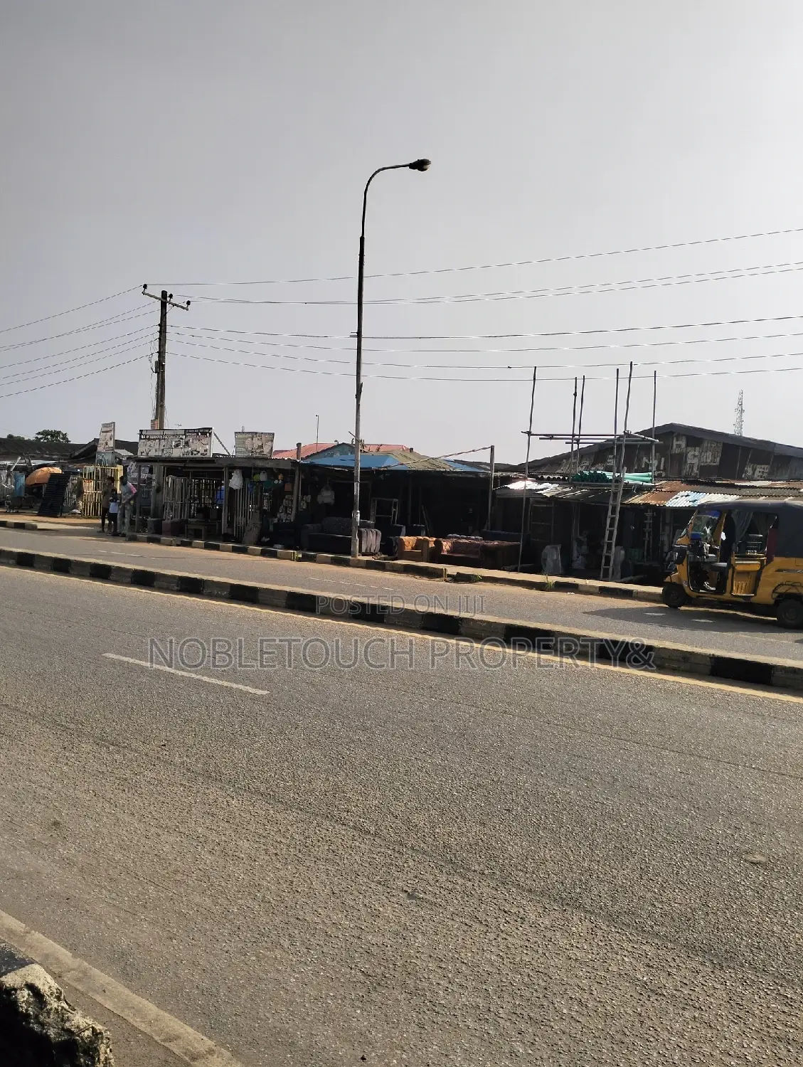 Commercial Building With Enough Shops Along the Major Road in Igando / Ikotun/Igando