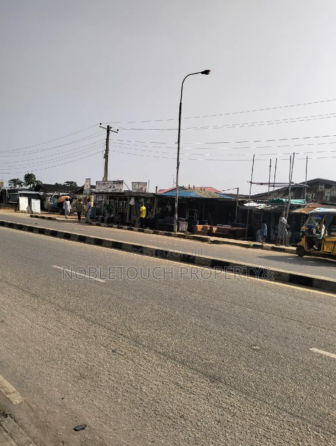 Commercial Building With Enough Shops Along the Major Road in Igando / Ikotun/Igando