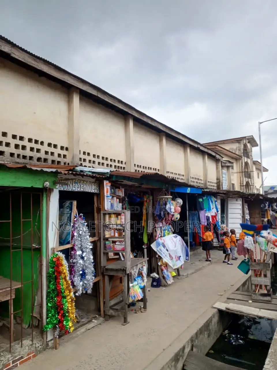 Massive Warehouse With Office Complex in Iba / Ojo
