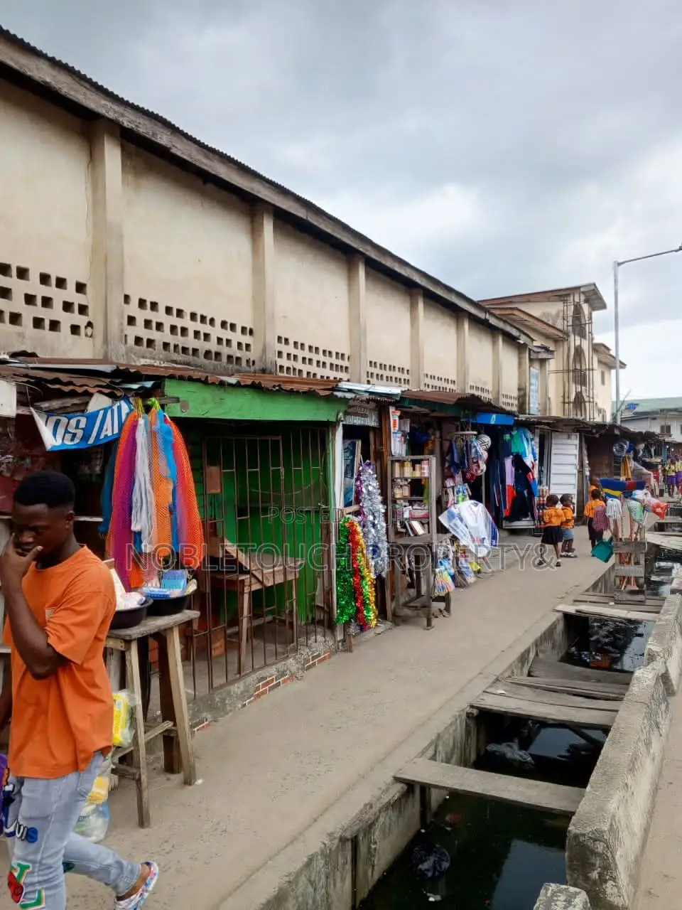 Massive Warehouse With Office Complex in Iba / Ojo