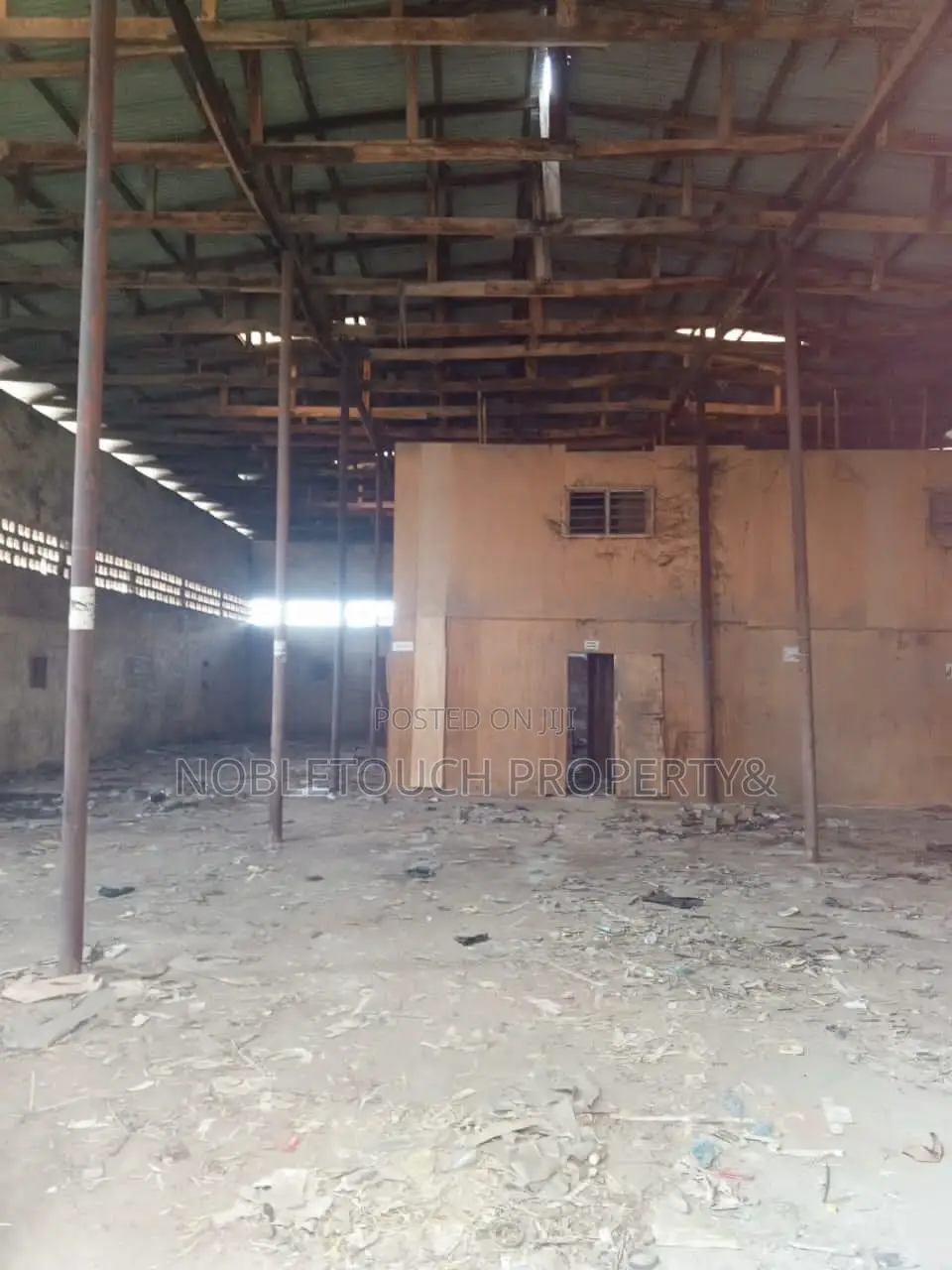 Massive Warehouse With Office Complex in Iba / Ojo