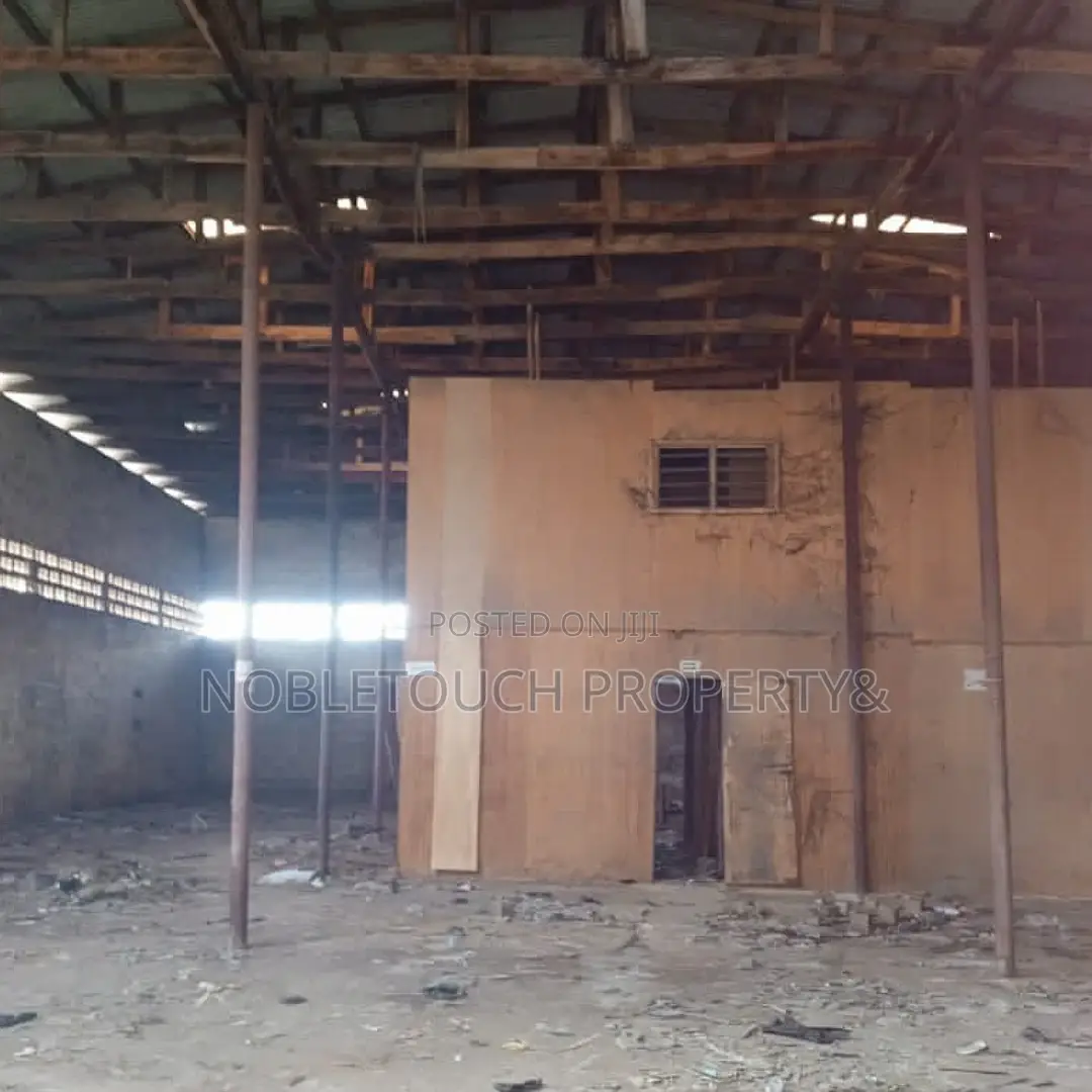 Massive Warehouse With Office Complex in Iba / Ojo