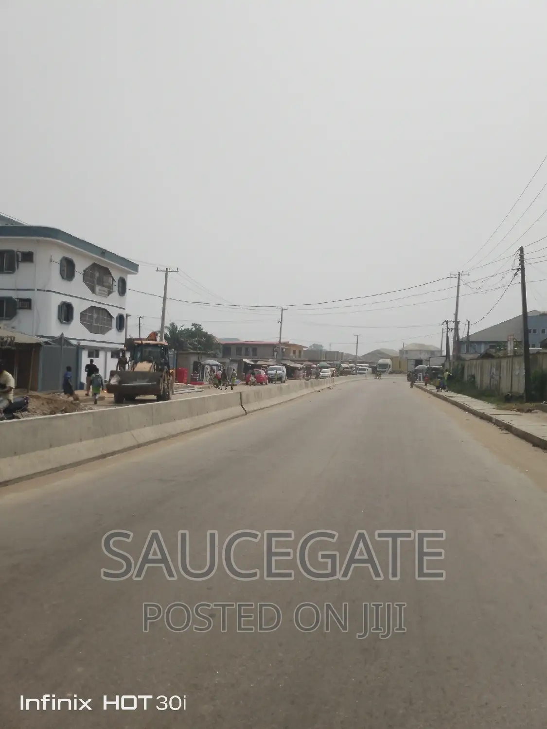A Commercial Land on a Busy Rd at Marwa Rd Ijegun Satellite in Satellite Town