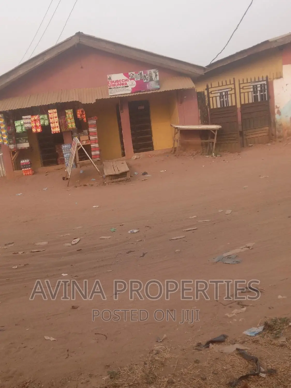 A Total of Converterble 10 Rooms With Two Shop in Owerri