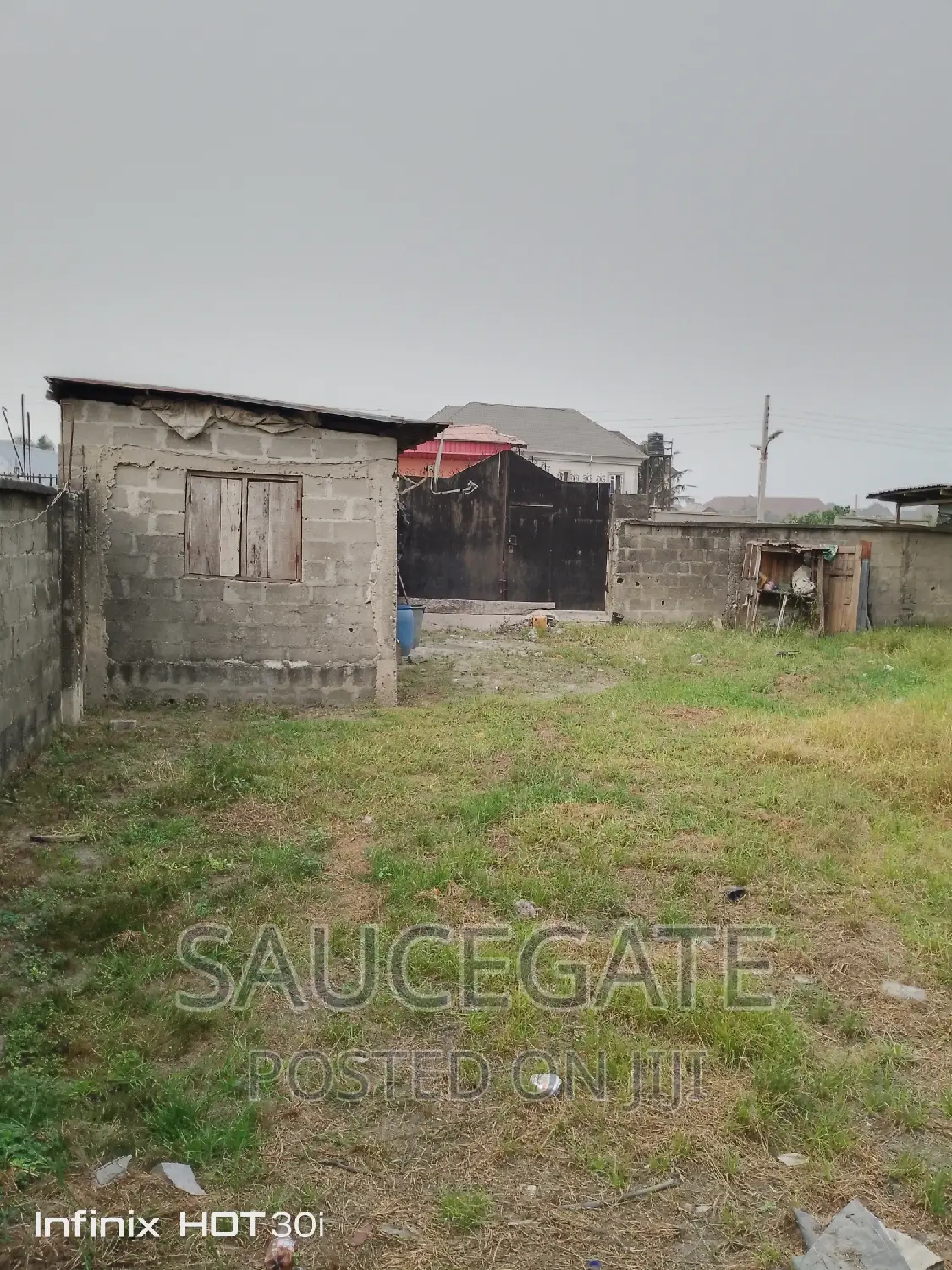 A Dry Land on the Road With C of O for Sale in Abule Ado