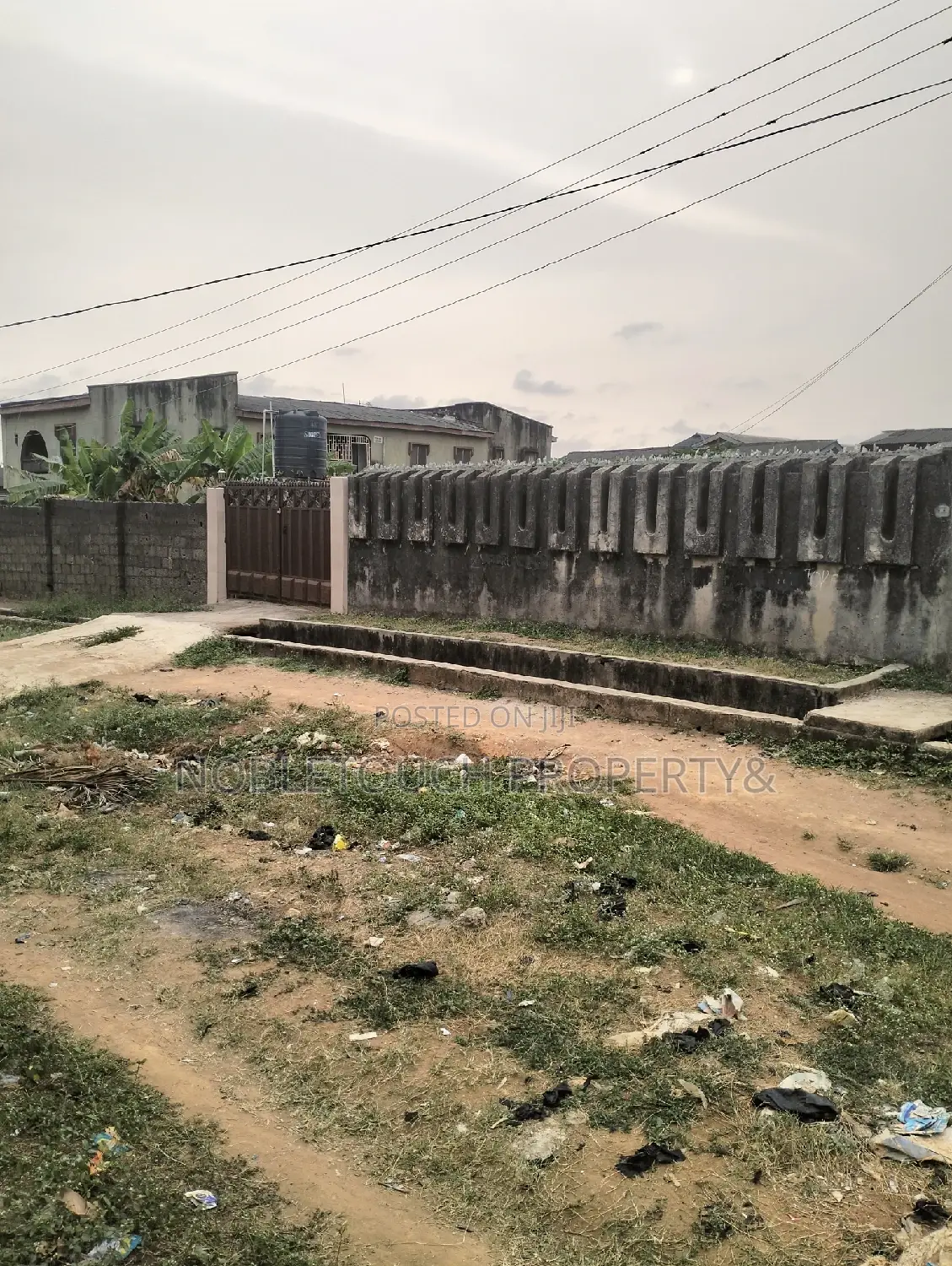 Empty Space/Land Along Oladun Road by Lasu Rd in Iseri Olofin