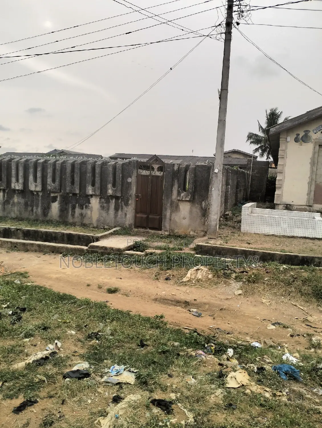 Empty Space/Land Along Oladun Road by Lasu Rd in Iseri Olofin