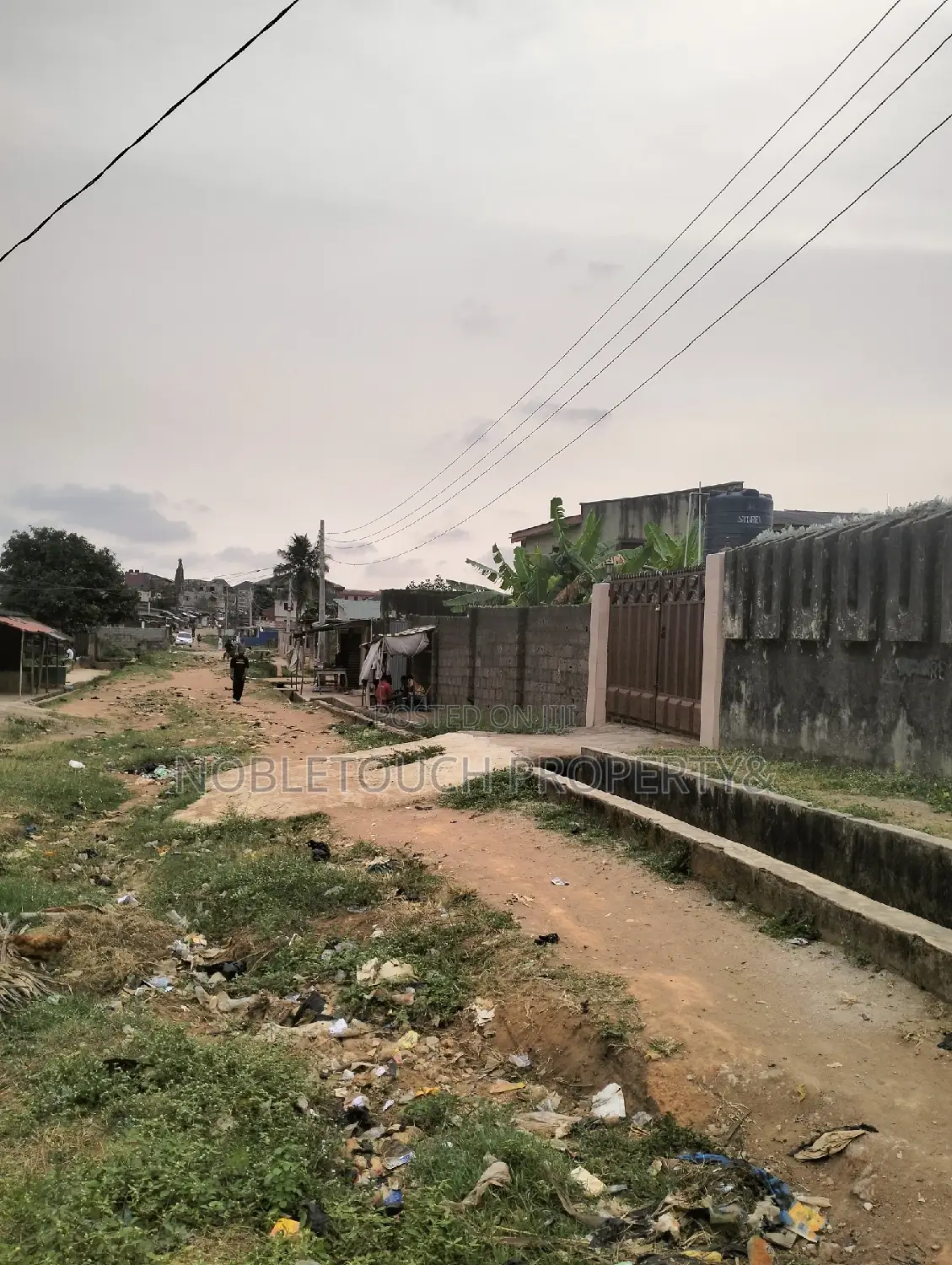 Empty Space/Land Along Oladun Road by Lasu Rd in Iseri Olofin