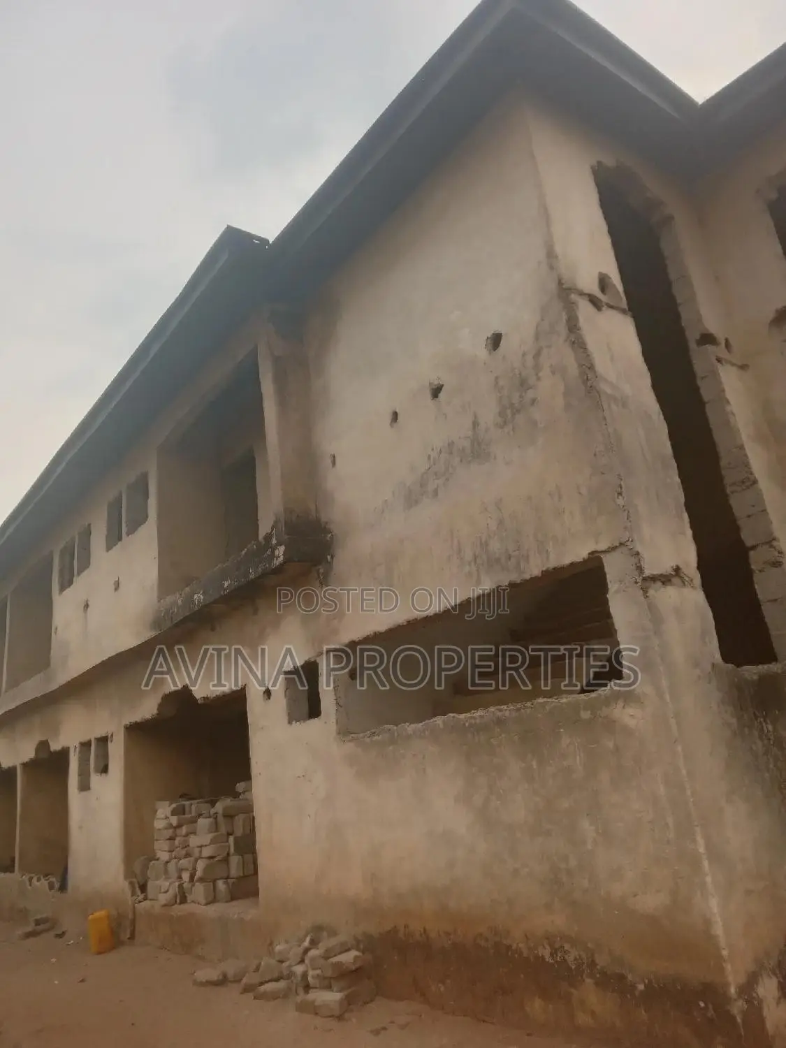 A Storey Building of 14 Room's to Converterble Flats 85% in Owerri