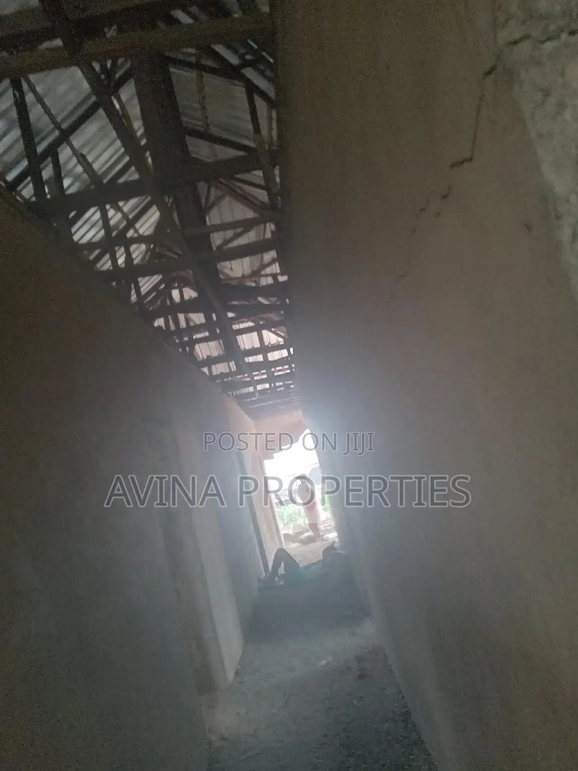 A Storey Building of 14 Room's to Converterble Flats 85% in Owerri