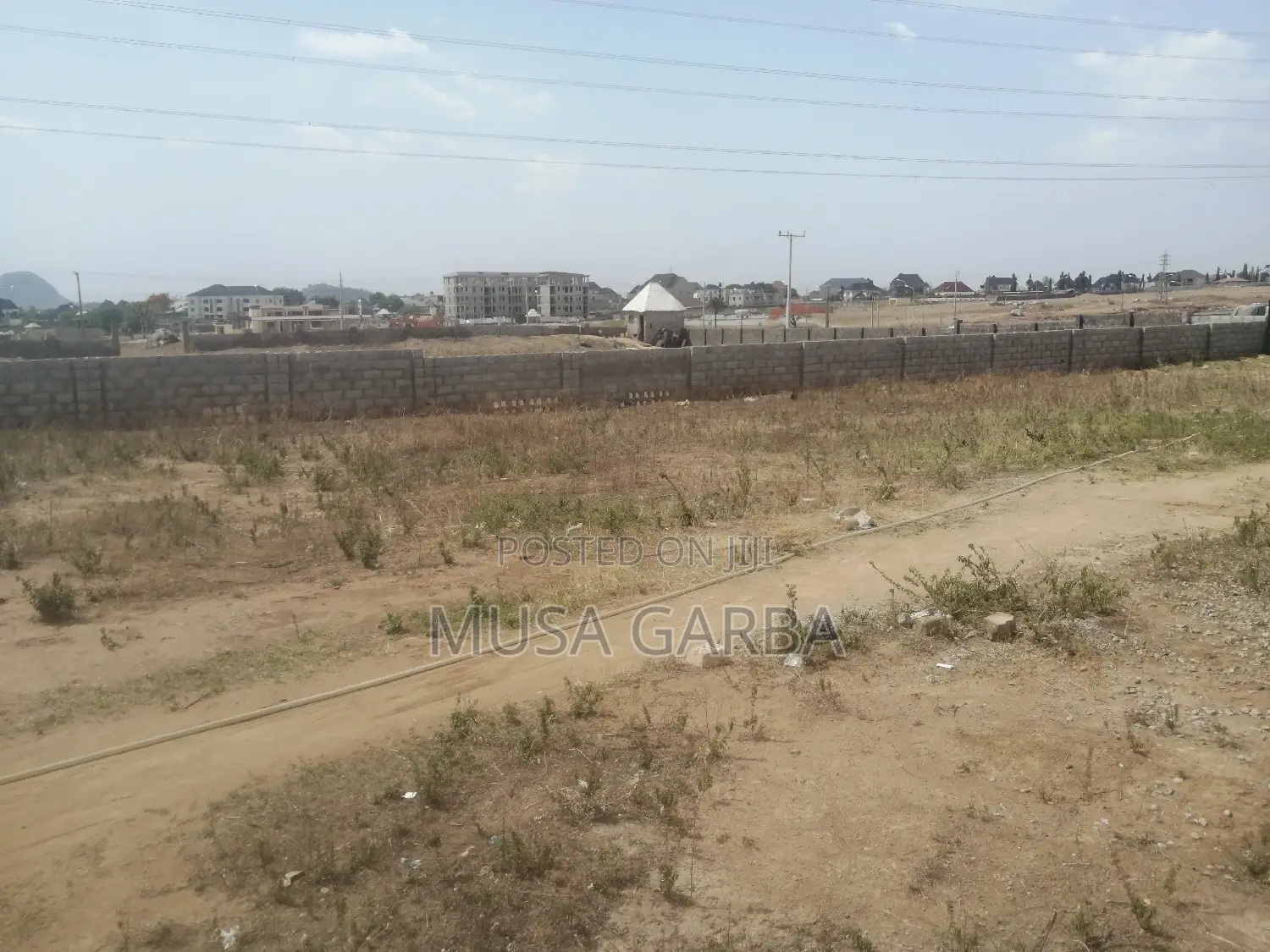 Prime Plot: Your Gateway to Convenience in a Mini Estate in Lugbe District