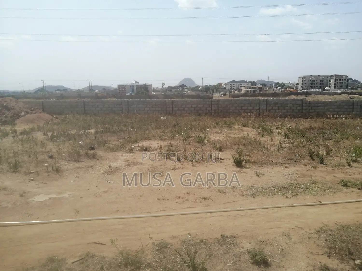 Prime Plot: Your Gateway to Convenience in a Mini Estate in Lugbe District