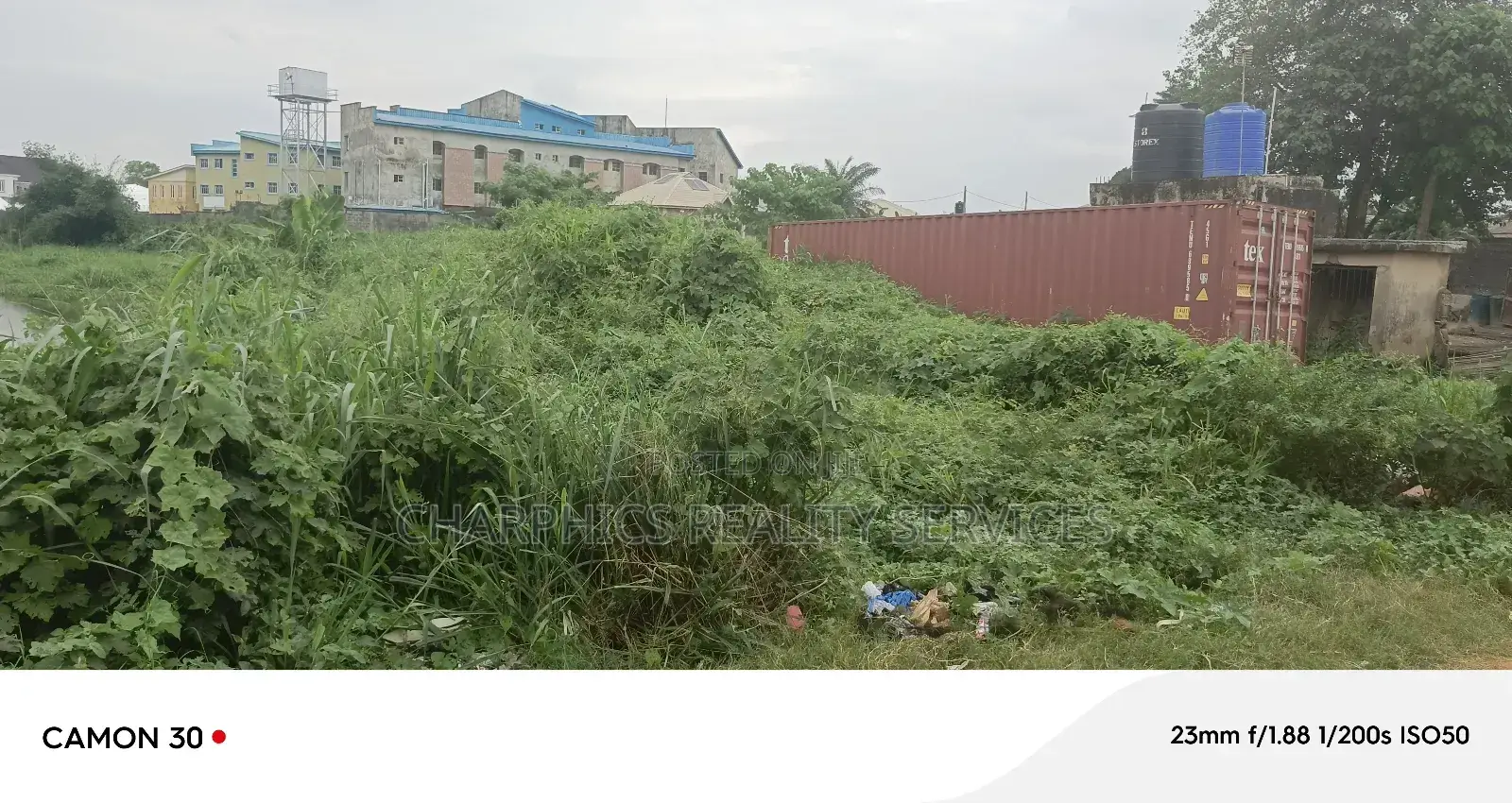 1 Acre Of Empty Land Fenced And Gated Facing Ago Palace Way in Ago Palace