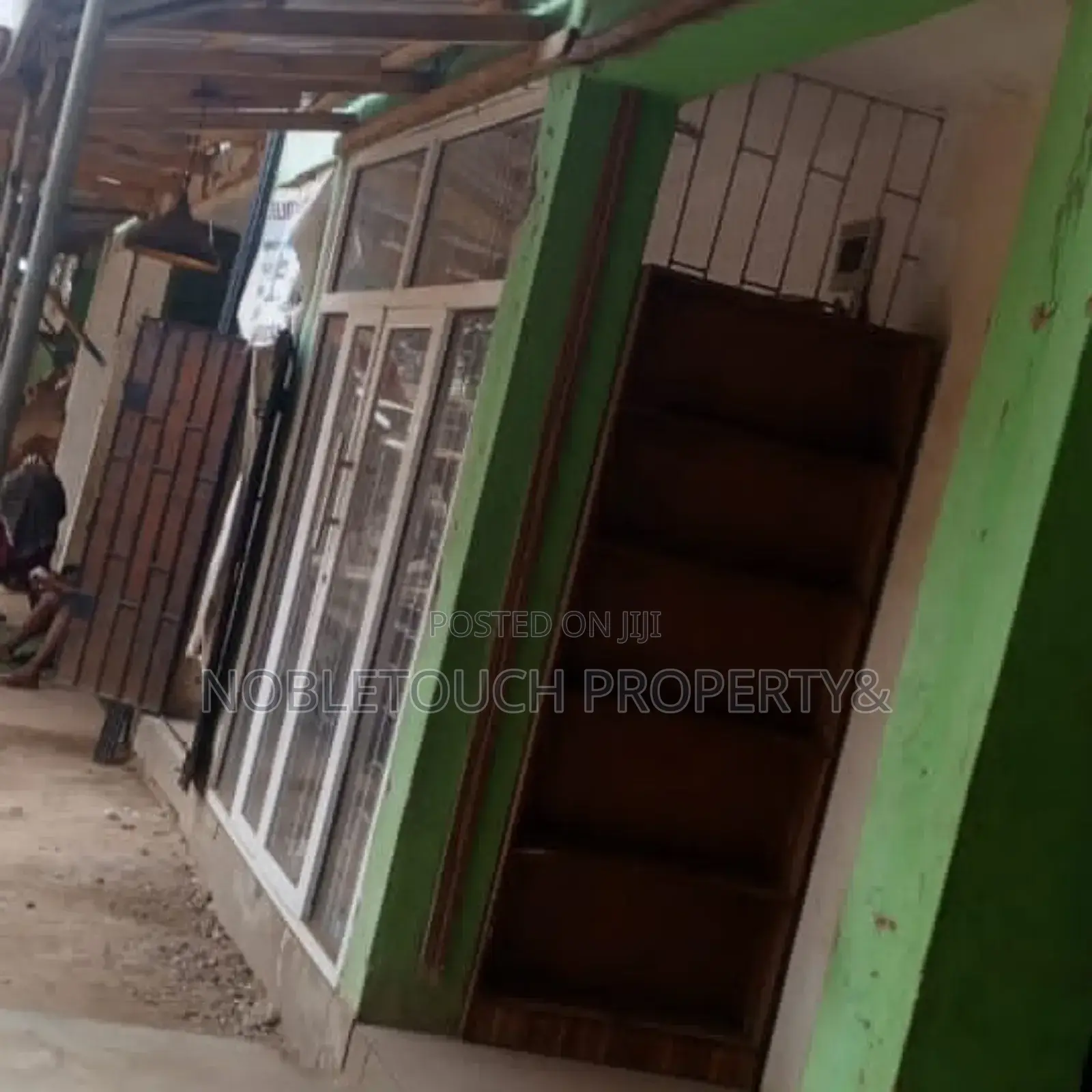 Shopping Complex Along the Major Road at Lasu Igando Road in Akesan
