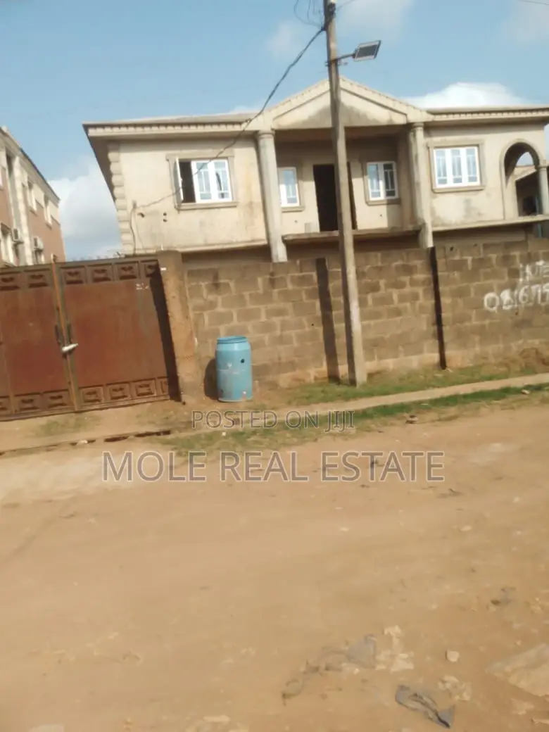 Half Plot of Land by Kwara Bustop Fenced in Alimosho