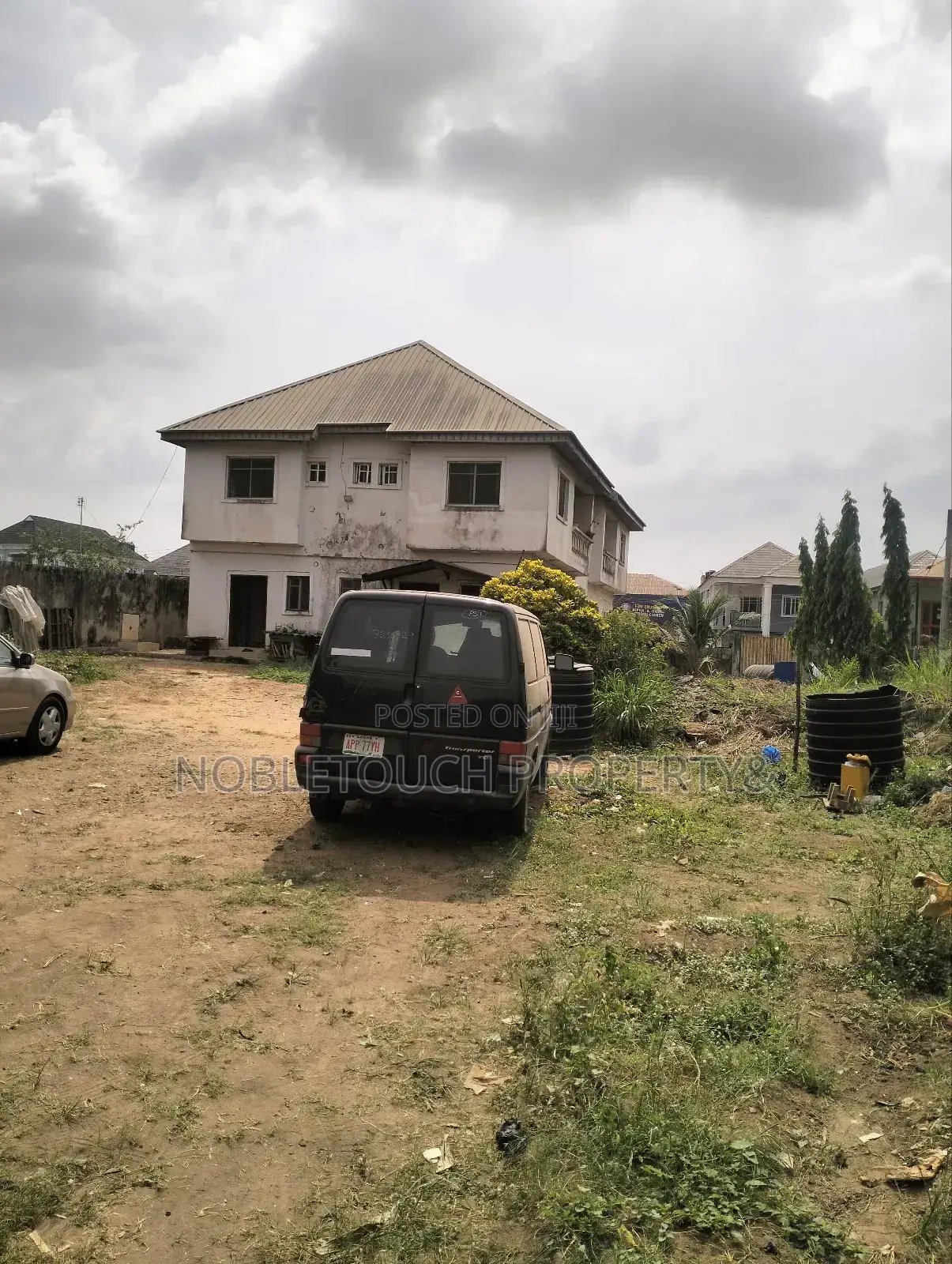 2plots With Structure Along the Major Rd at Idimu Orisunbare in Iseri Olofin