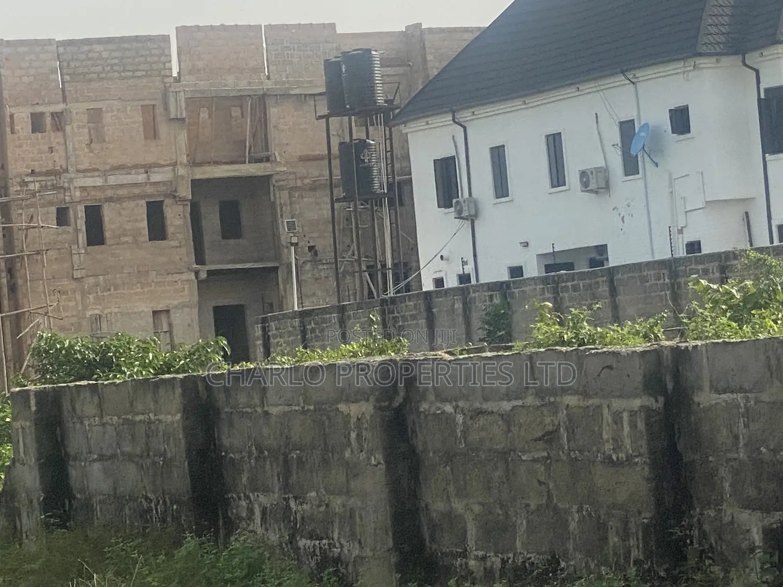 Nice 50ft by 100ft With C of O Fenced Round in Amagba, G.R.A in Benin City