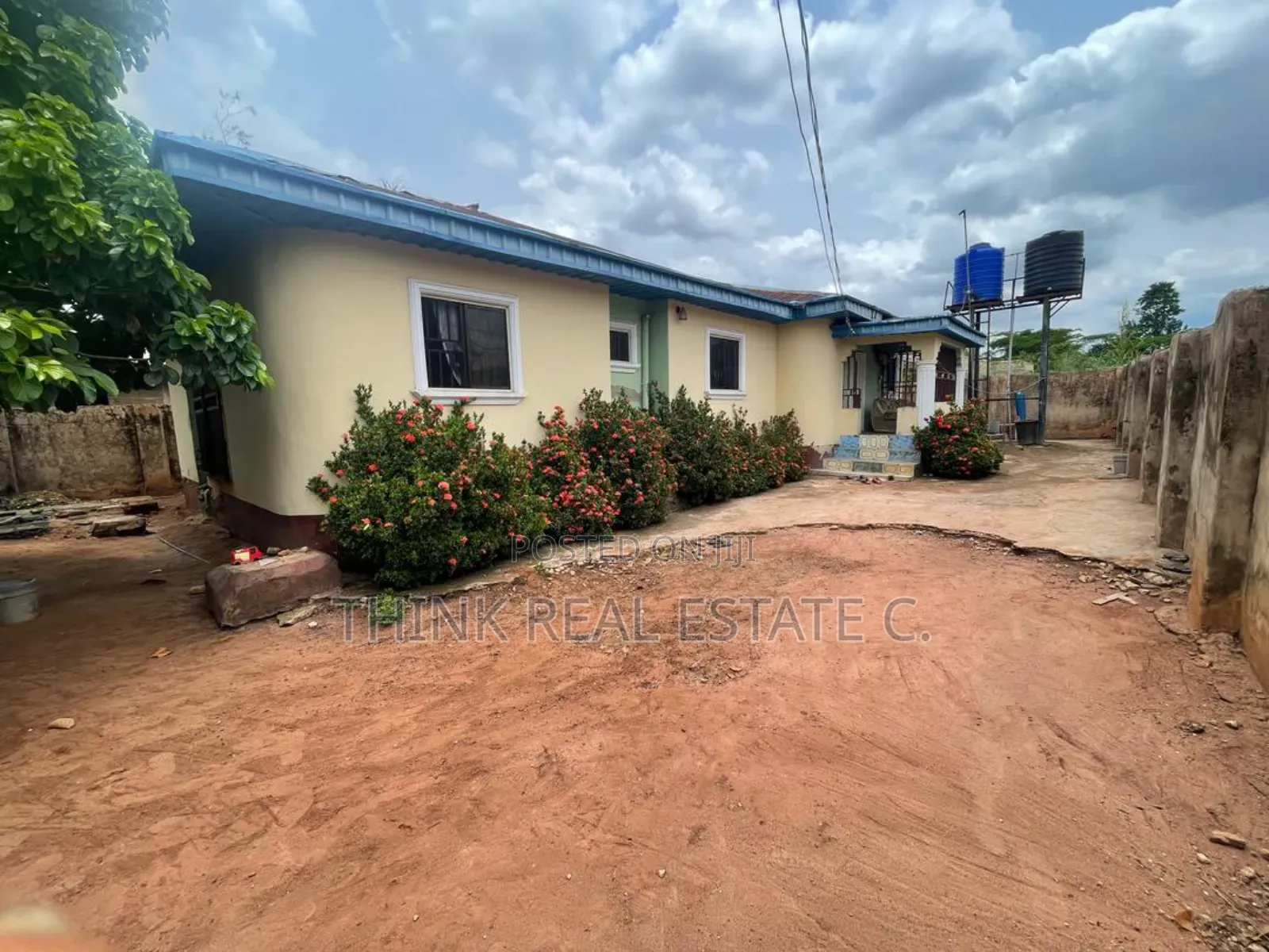 50/100 at Isihor With a Bungalow on It for Sale in Benin City