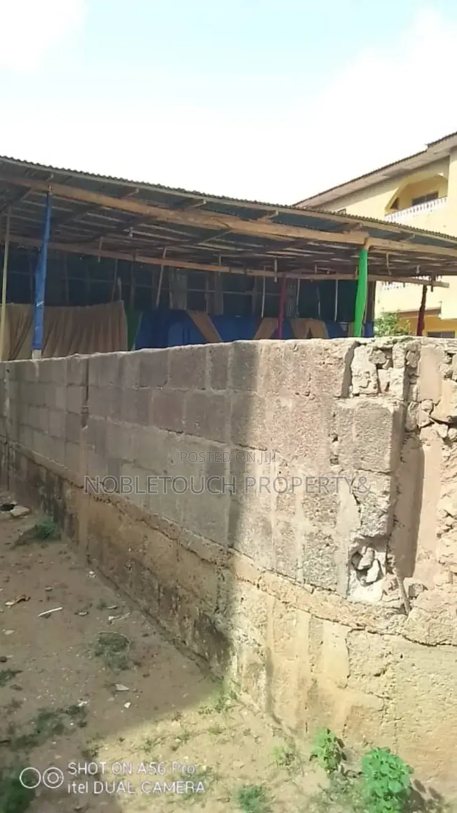 Commercial One Half Plot With Shops Along Ikotun Idimu Rd in Iseri Olofin