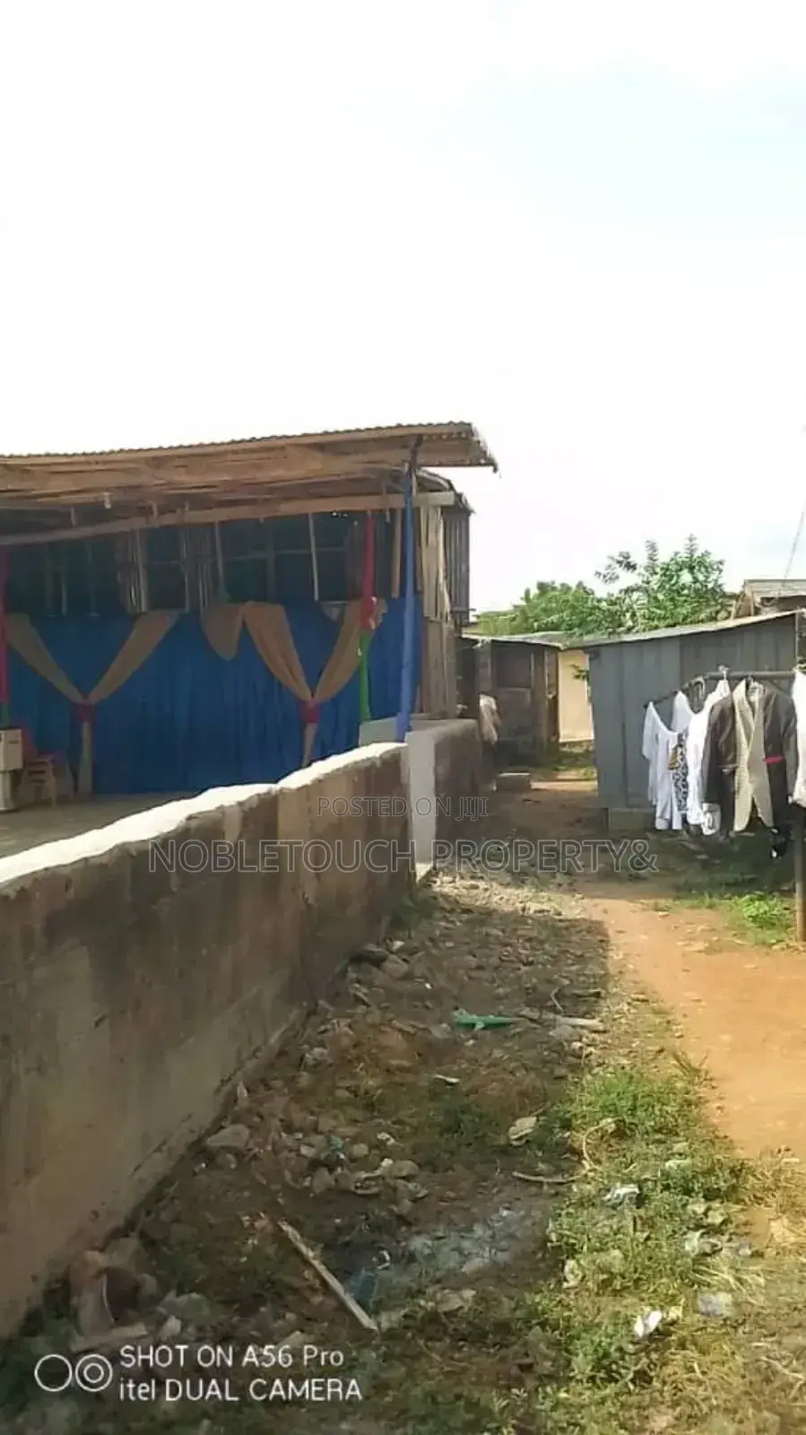 Commercial One Half Plot With Shops Along Ikotun Idimu Rd in Iseri Olofin