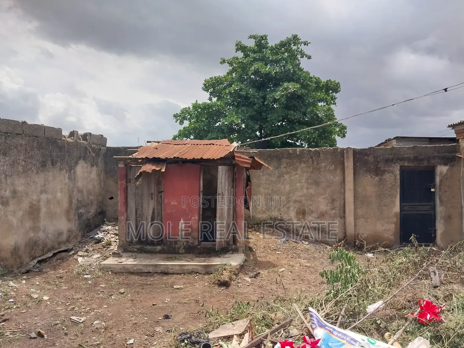 Half Plot 4 Lockup Shops a Hall Facing Ikotun Iguando Rd in Ikotun / Ikotun/Igando