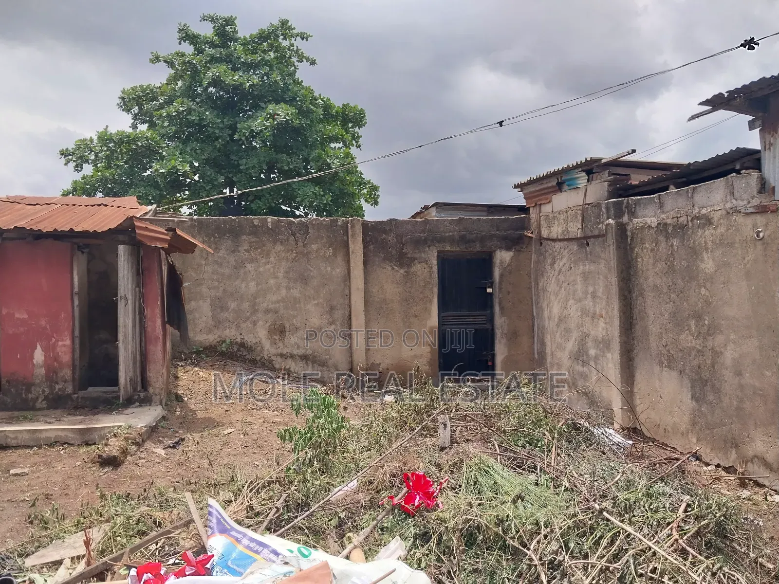 Half Plot 4 Lockup Shops a Hall Facing Ikotun Iguando Rd in Ikotun / Ikotun/Igando