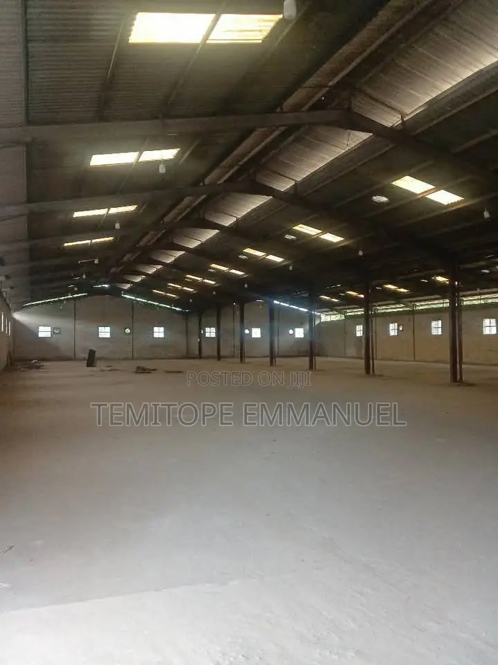 Massive 2 Different Bays of Warehouse in a Good Area in Ikotun / Ikotun/Igando
