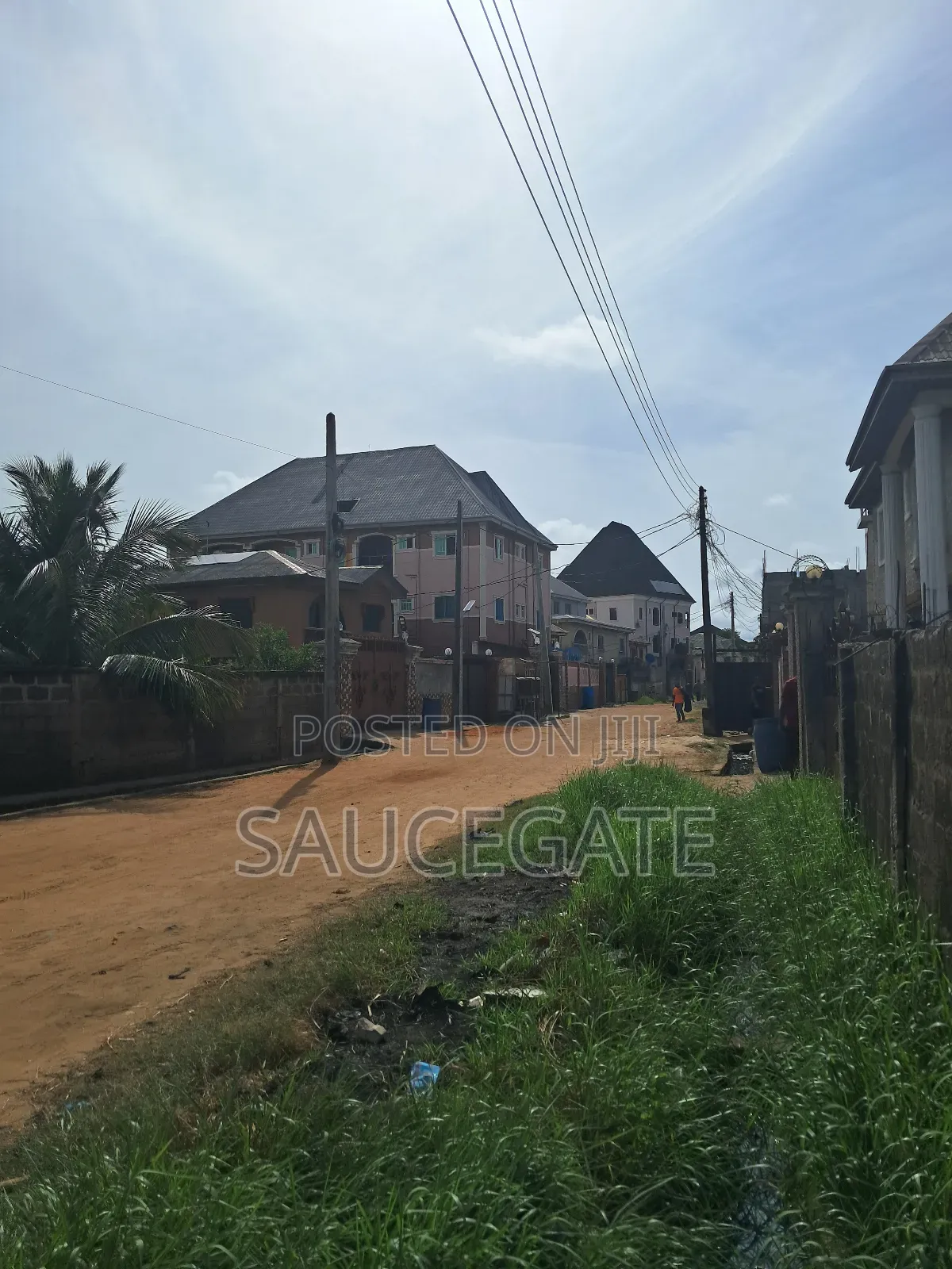 Half Fenced Dry Plot at Satellitetown Good Land in Satellite Town
