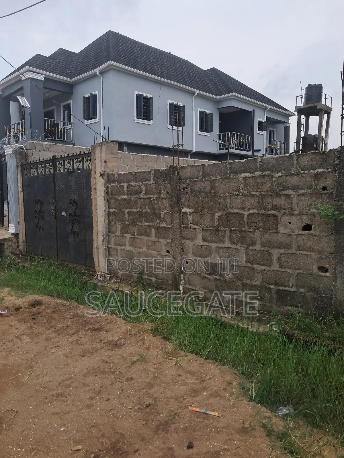 Half Plot Fenced and Gated Dry at Ijegun Satellite Good in Satellite Town