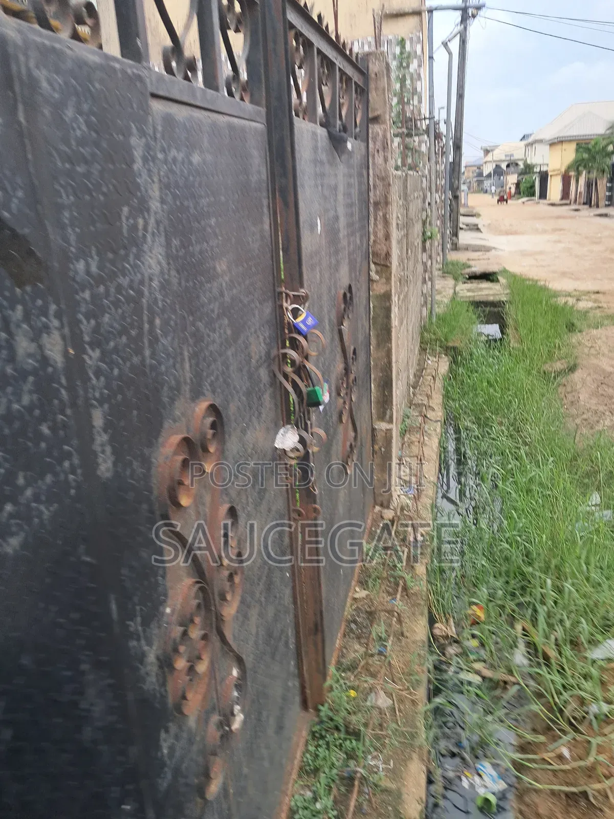 Half Plot Fenced and Gated Dry at Ijegun Satellite Good in Satellite Town