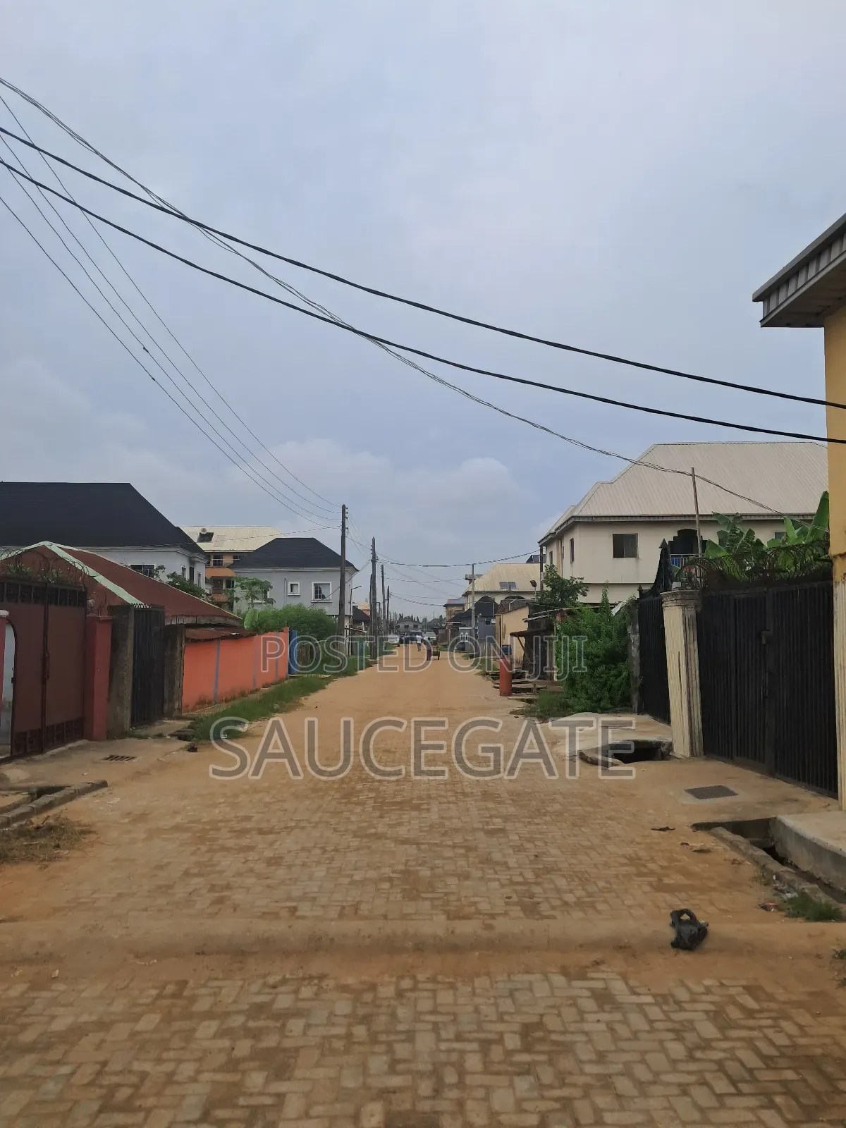 Half Plot Fenced and Gated Dry at Ijegun Satellite Good in Satellite Town
