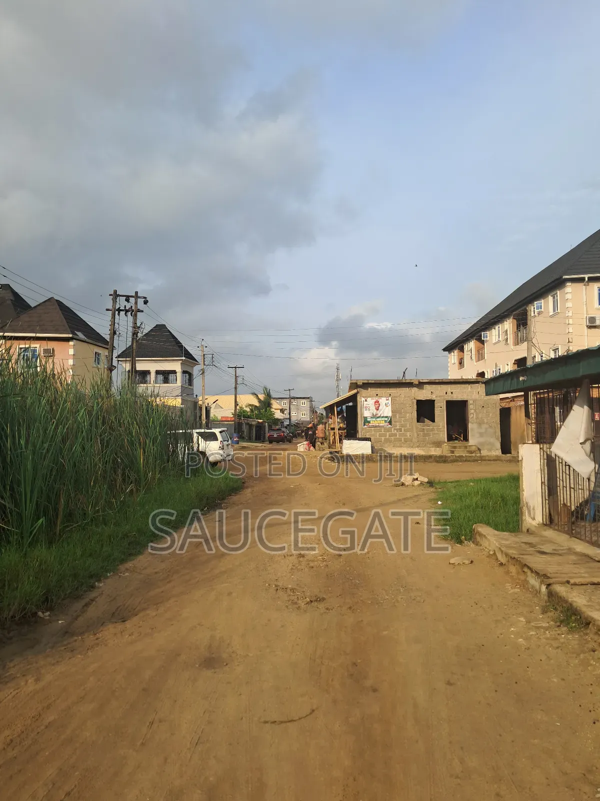 Half Plot for Sale With Old Bungalow at Ijegun Satellite in Satellite Town