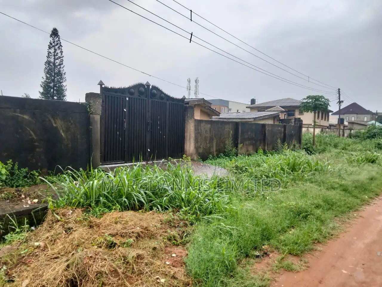 For Sale, a Plot + an Old Building in Fed Low Cost Estate in Ikorodu Garage