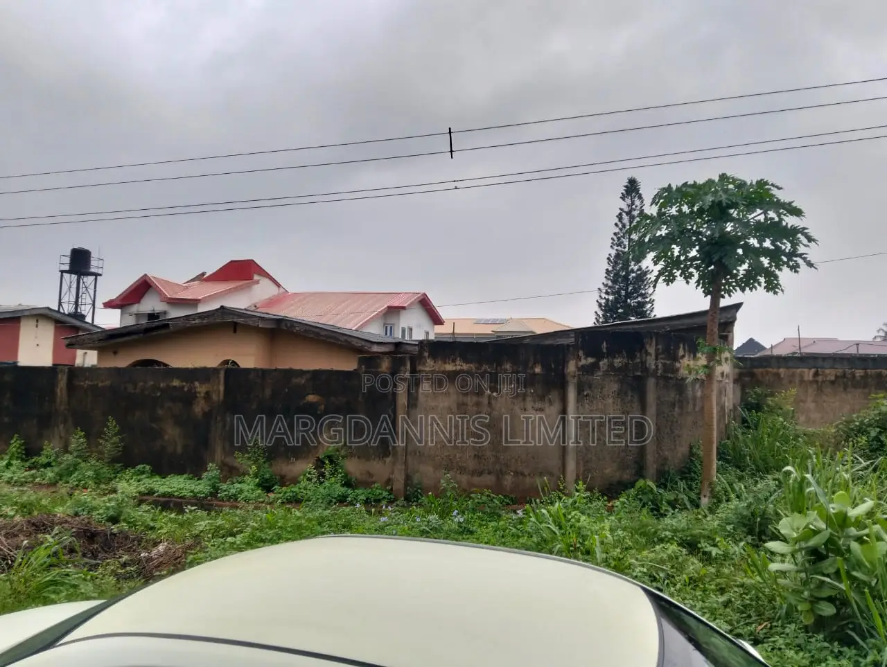 For Sale, a Plot + an Old Building in Fed Low Cost Estate in Ikorodu Garage