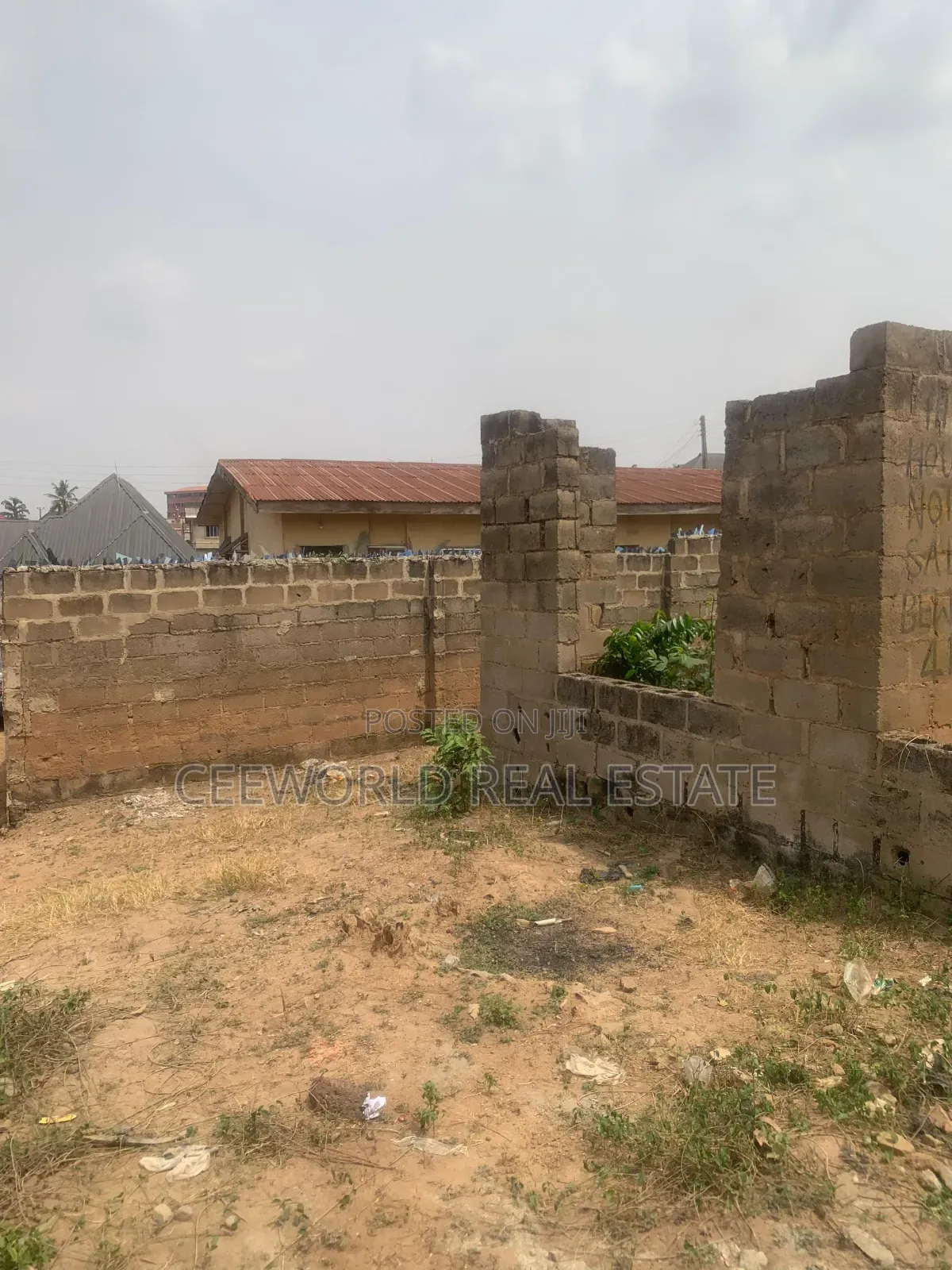 A Standard Plot of Land With an Incomplete Building in Akobo