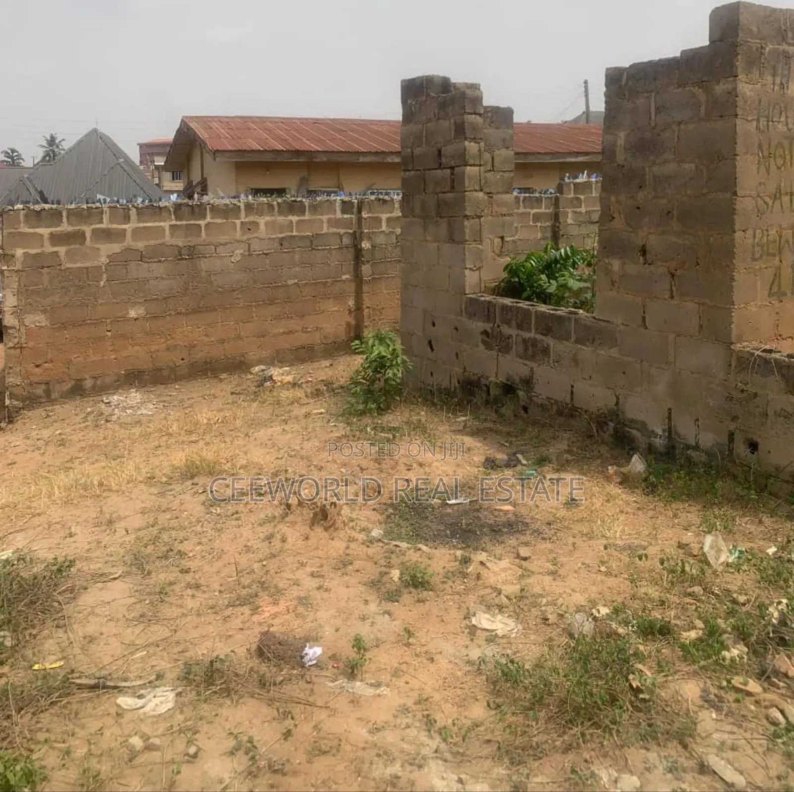 A Standard Plot of Land With an Incomplete Building in Akobo
