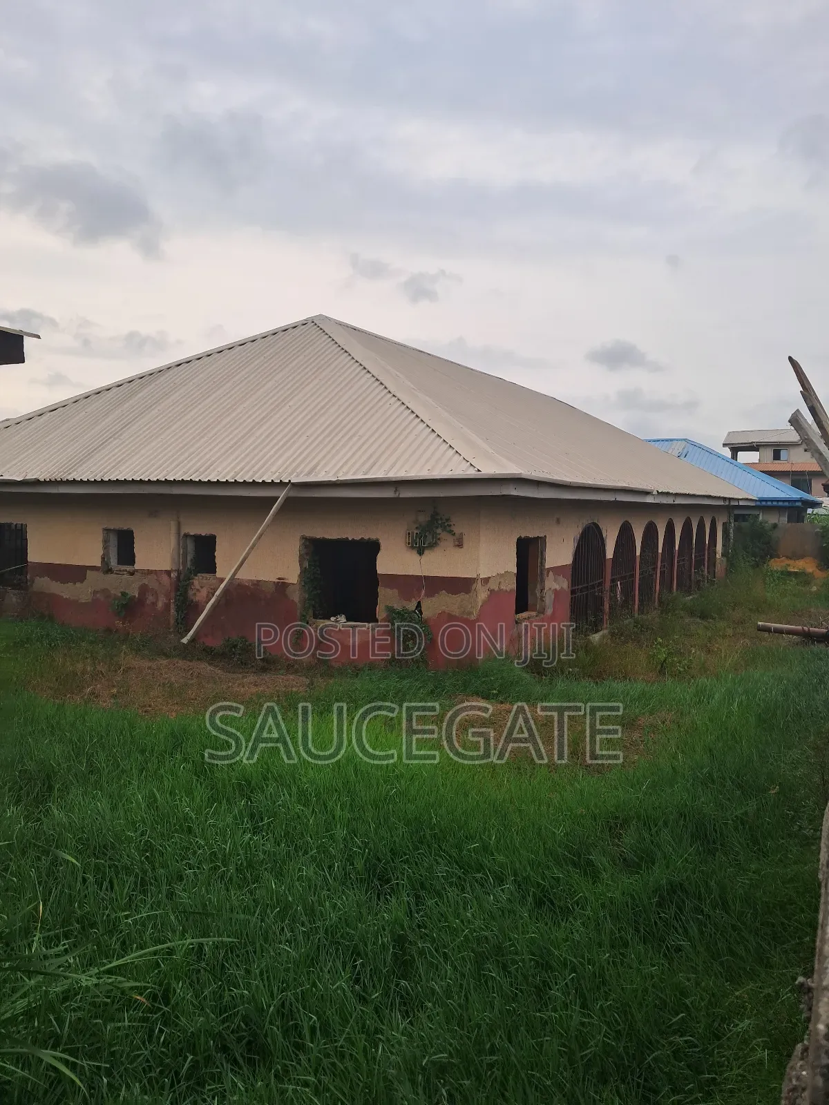 A Land With an Old Demolisbale Building at Ijegun Good Deal in Satellite Town