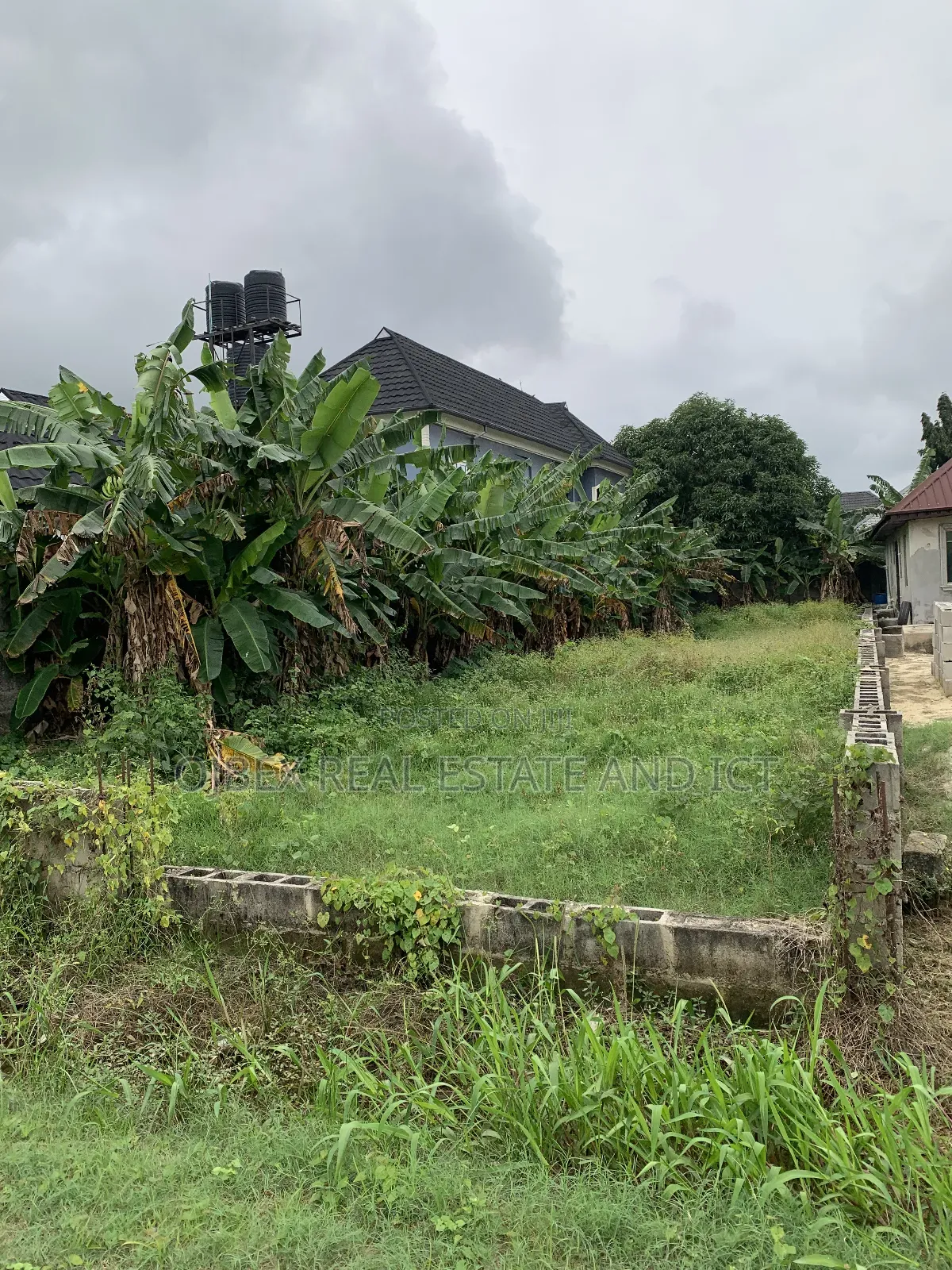 Half Plot of Land With C of O in Ajah