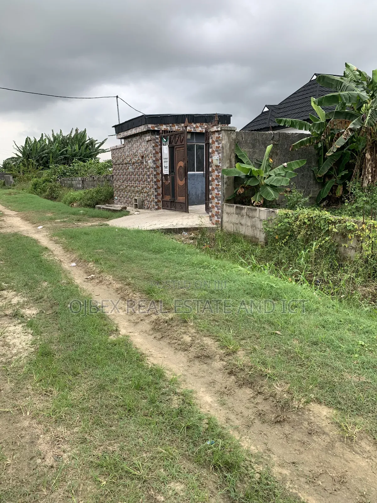 Half Plot of Land With C of O in Ajah