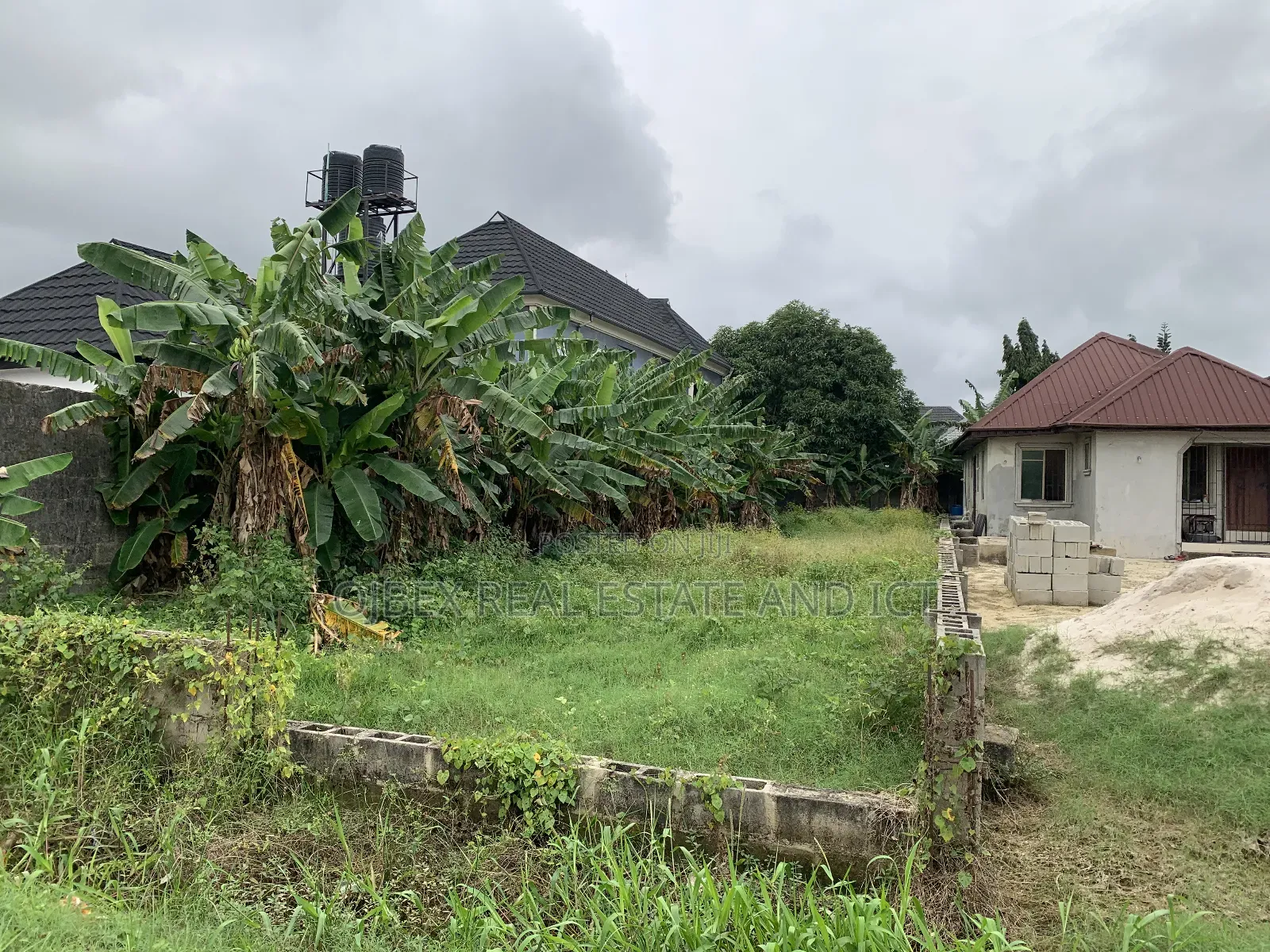 Half Plot of Land With C of O in Ajah
