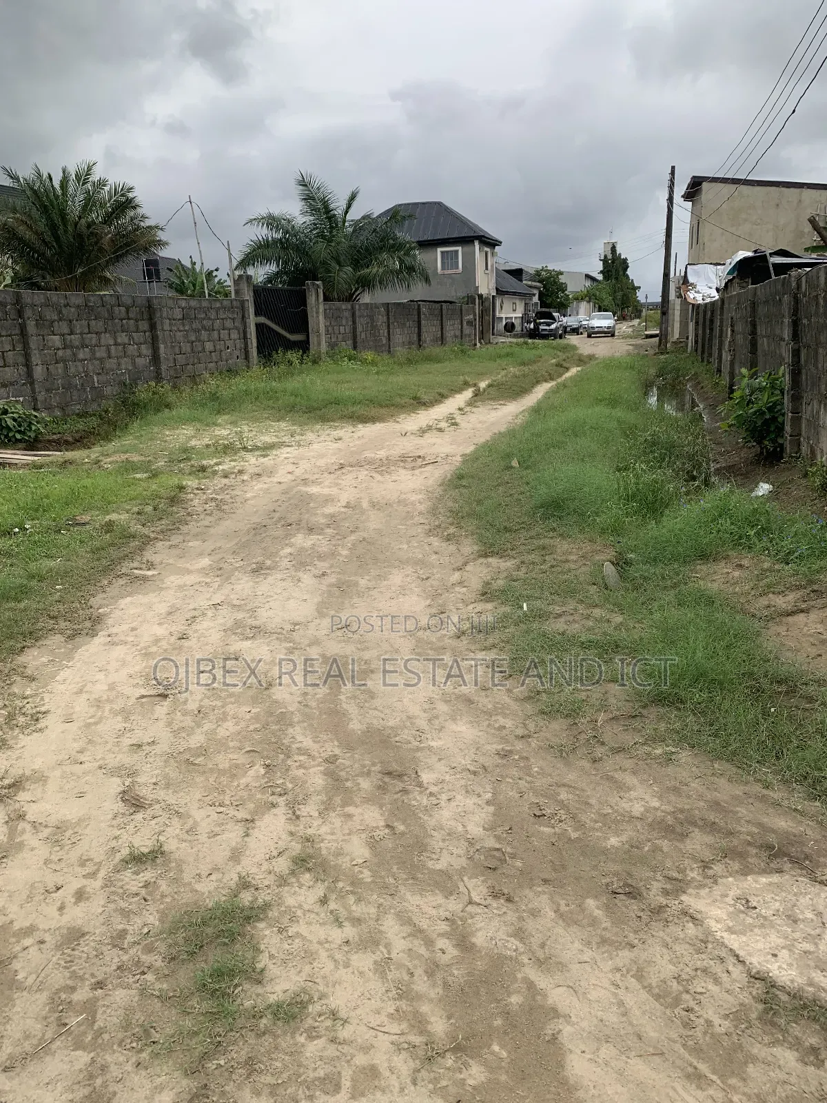 Half Plot of Land With C of O in Ajah