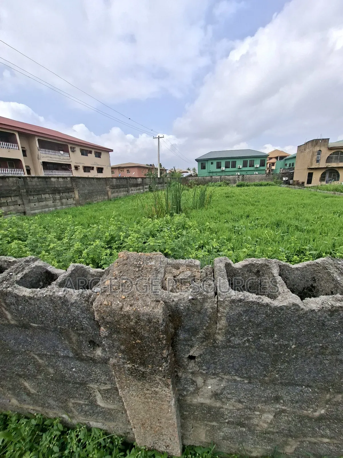 965sqm Cornerpiece Residential/Commercial Land in Ago Palace